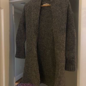 Wool blend. Slightly shrunken.